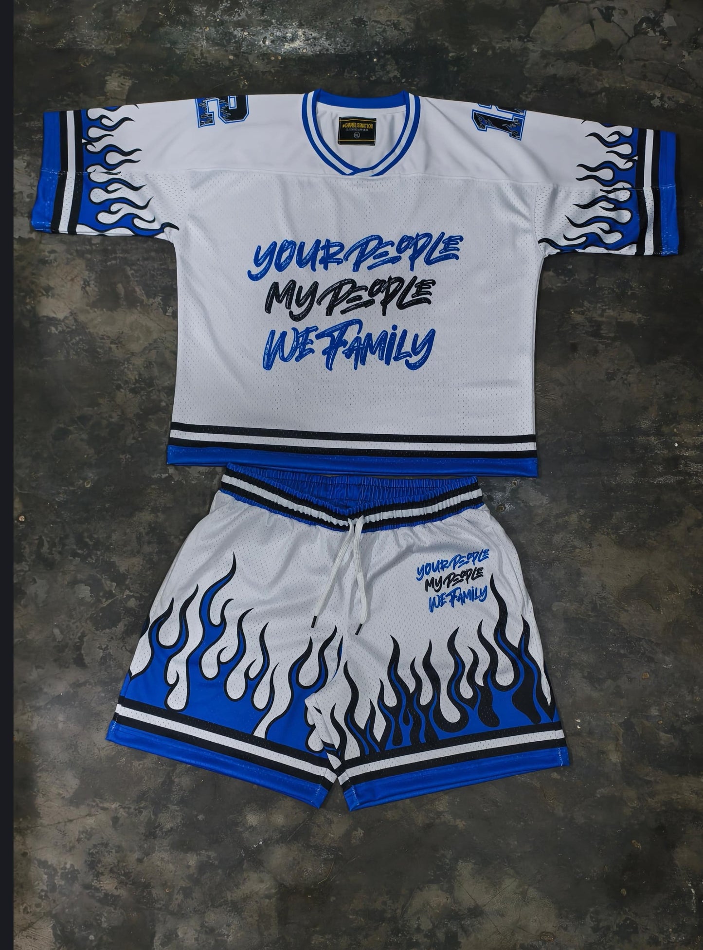 WHITE AND BLUE JERSEY AND SHORTS